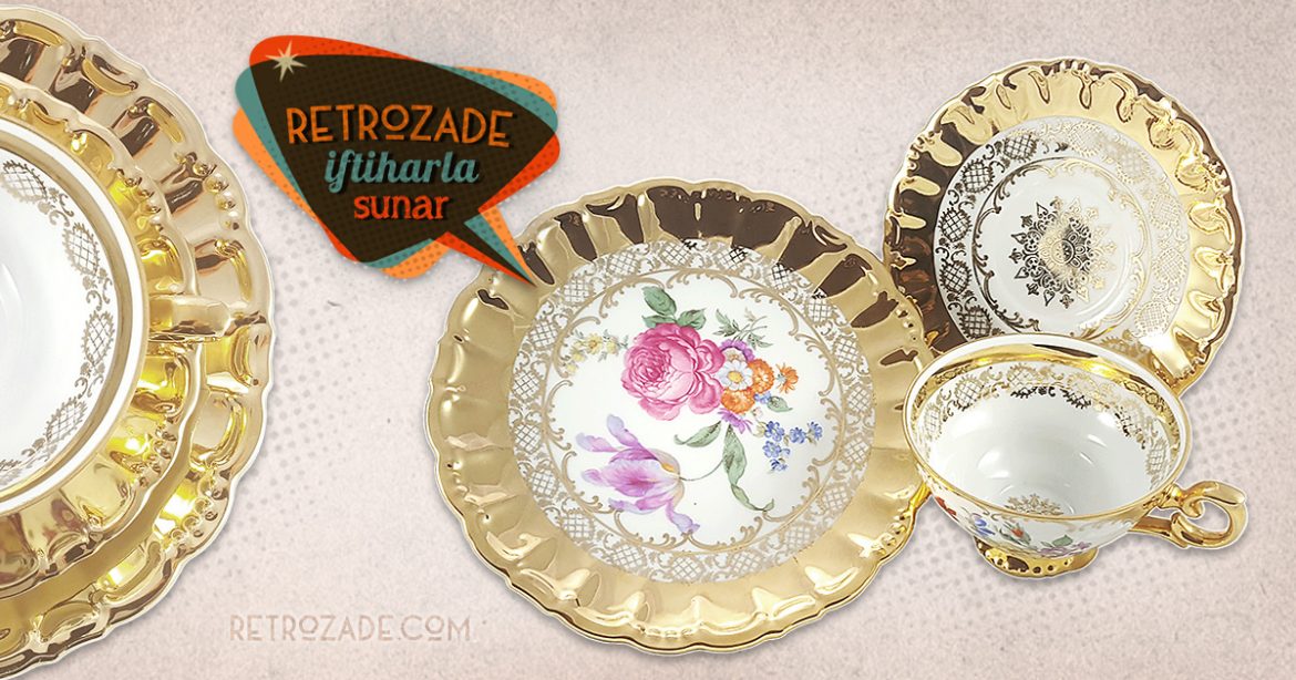 Bavaria trio fincan takımı Goldie; pasta tabağı & çay fincanı ve tabağından oluşan porselen set. Altın yaldızlarla bezenmiş rengarenk çiçekler Retrozade'de! Retrozade Vintage • Retro • Antika